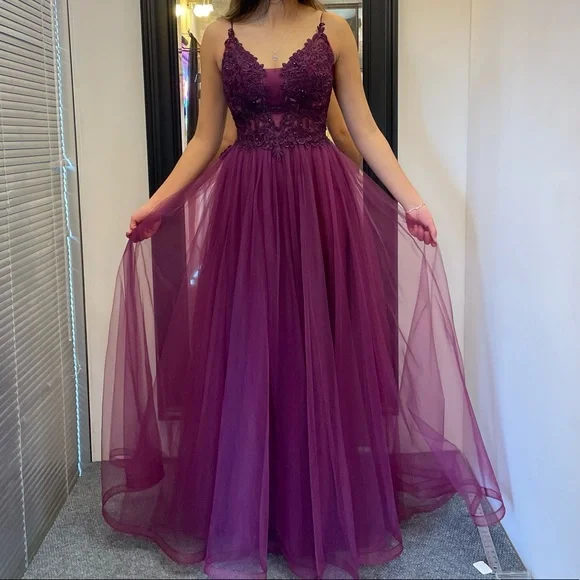 A beautiful size four grad dress, altered to fit size 2-4 in length and waist. - Picture 1 of 3